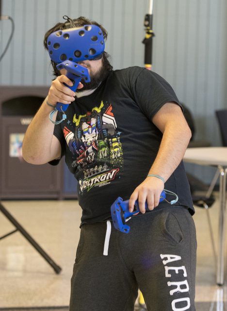 Alejandro Zamorano plays a virtual reality game.