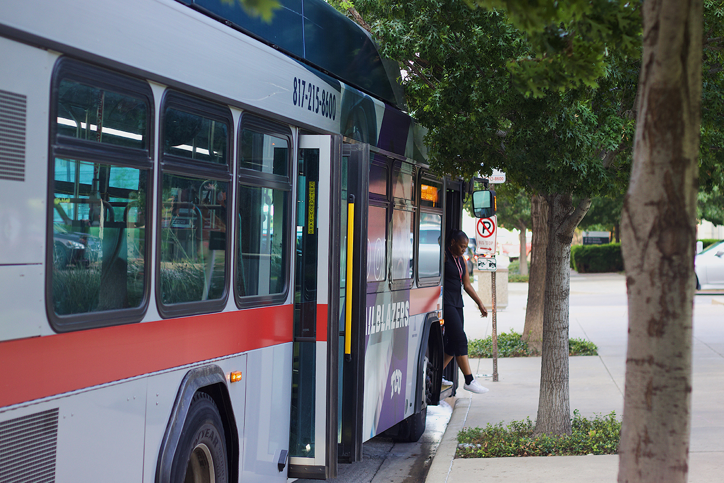 TR student Virginia Adams steps off a Trinity Metro bus on TR Campus. TCC students can ride the Trinity Metro bus for free.