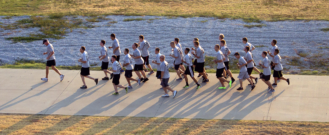 NW police academy students run as a group during the 9/11 memorial run on Sept. 11, 2013. The NW police academy will again be a part of the next memorial run Sept. 11.