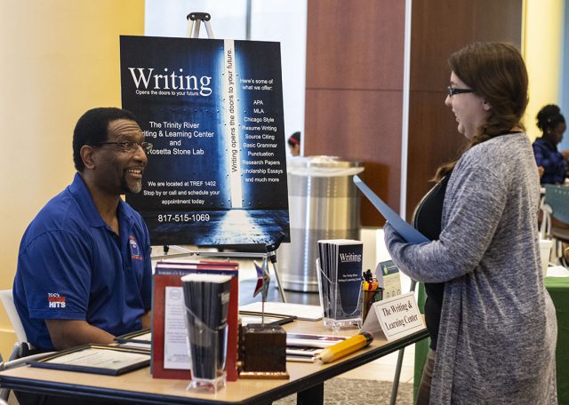 TR learning center coordinator Steven LeMons discusses writing opportunities with TR student Marietta Huaute Aug. 29. 
