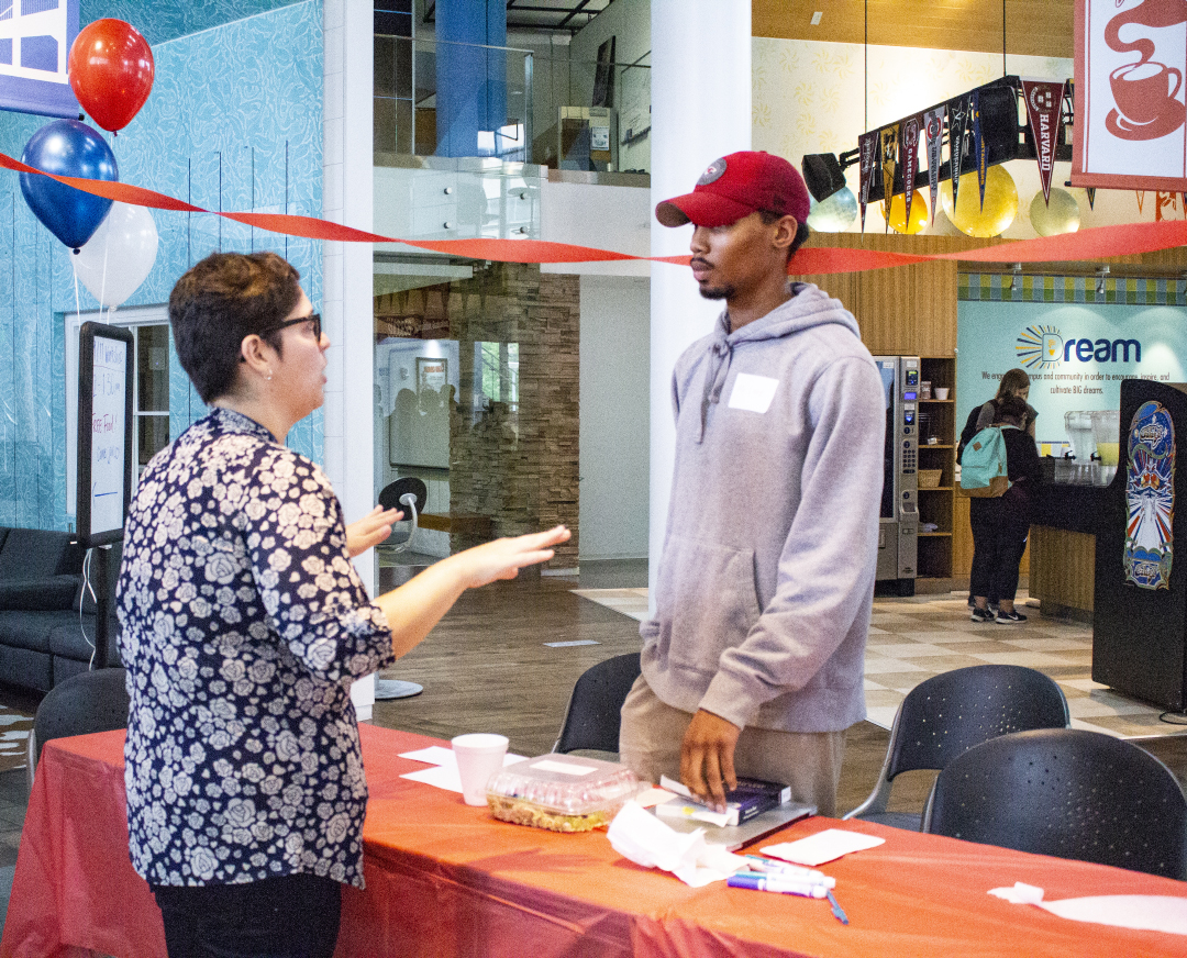 TR student development associate Cortney Walden continues to discusses the difference between kindness and niceness with TR student Justin Lane after the event.