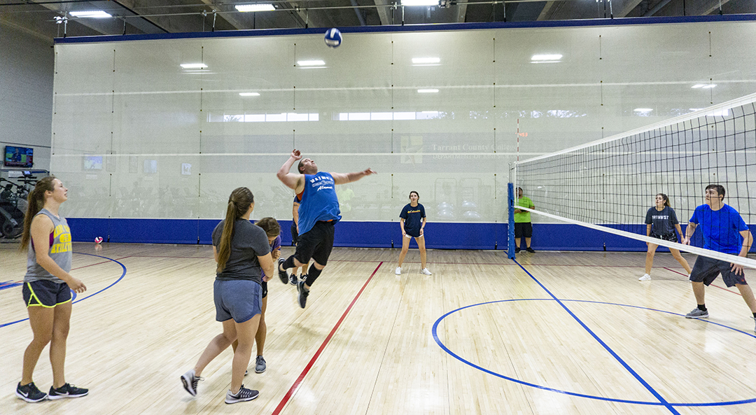 NW student Hans Reeves lines up to spike the volleyball during NW’s intramural volleyball tournament Sept. 6. Most campuses offer different intramural sports during the semester.