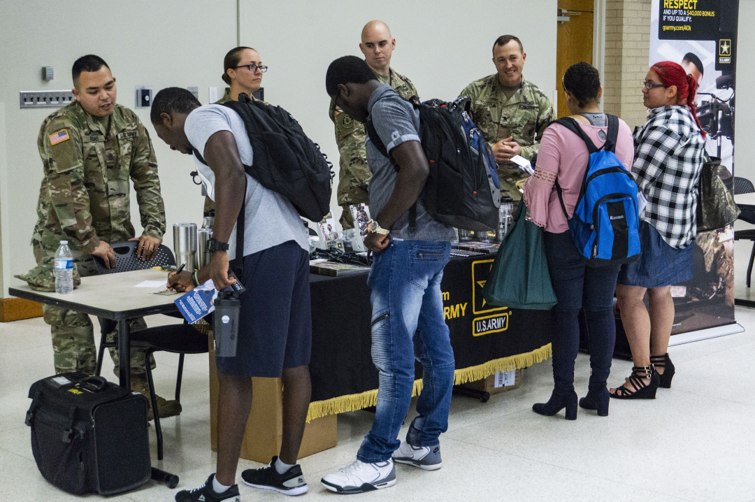 NW students and community members find out information about the U.S. Army at the NW Military Career Fair Sept. 12. All branches of the military had tables set up during the event.