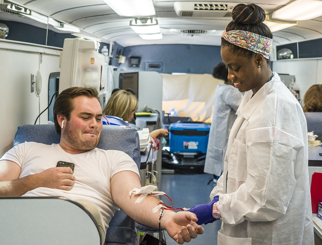 A nurse from Carter BloodCare draws blood from a NE student who donated at the health fair Oct. 10. South’s health fair is 10 a.m.-2 p.m. Oct. 17 in the SSTU dining hall.
