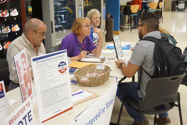 Volunteer+deputy+registrar+Terri+Kelley+assists+NW+student+Jorge+Navarrete+with+registering+to+vote+Sept.+24+on+NW.+The+process+took+each+student+about+five+minutes.