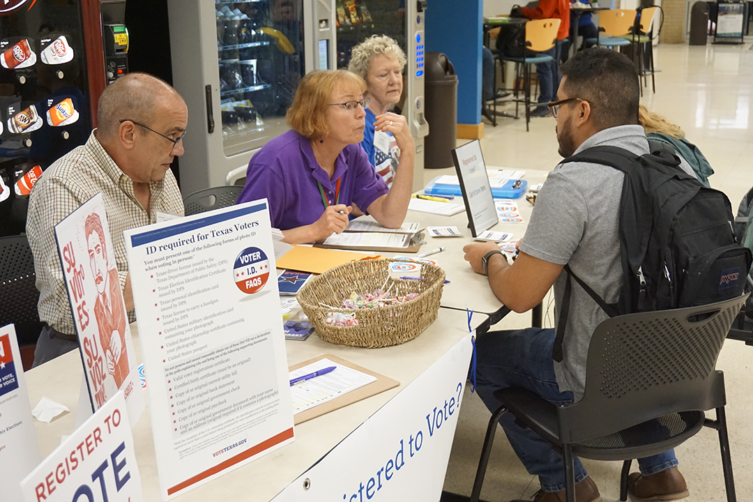 Volunteer deputy registrar Terri Kelley assists NW student Jorge Navarrete with registering to vote Sept. 24 on NW. The process took each student about five minutes.