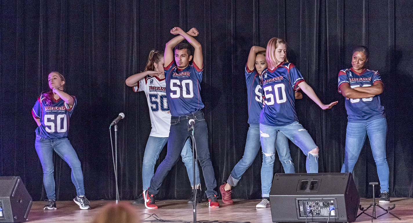 NE Campus’ Movers Unlimited dance company kicks off Harmony with a performance celebrating different dances from each decade of the campus’ 50-year history. Harmony was one of several homecoming events that took place Oct. 16-18 to celebrate NE Campus’ golden anniversary.