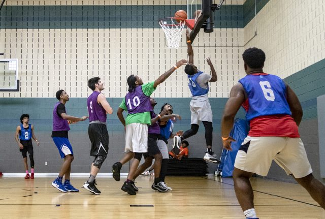 SE student Cecil Roberts of Buckets 2.0 goes for a layup against TCC Underdogs in the semifinals.