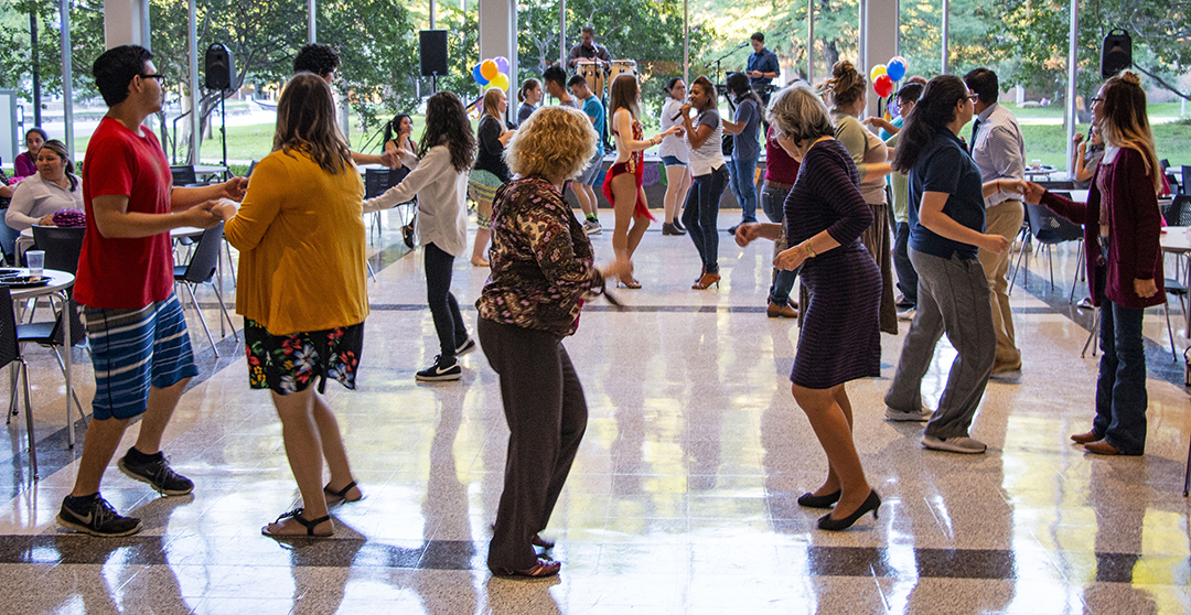 Students dance to live music at Salsa y Salsa Sept. 27 in the SSTU patio on South Campus. Attendees received free dance lessons and learned how to salsa, merengue and bachata.