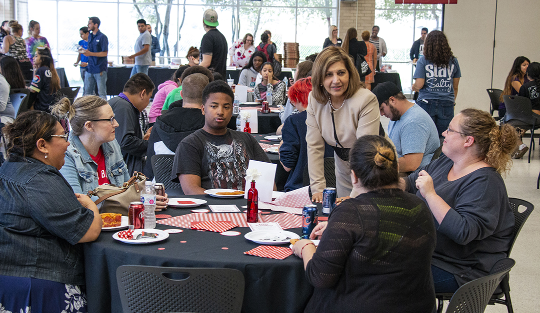 NW president Zarina Blankenbaker talks to students during Pizza with the President Sept. 25 on NW. Blankenbaker walked about to speak with students directly.