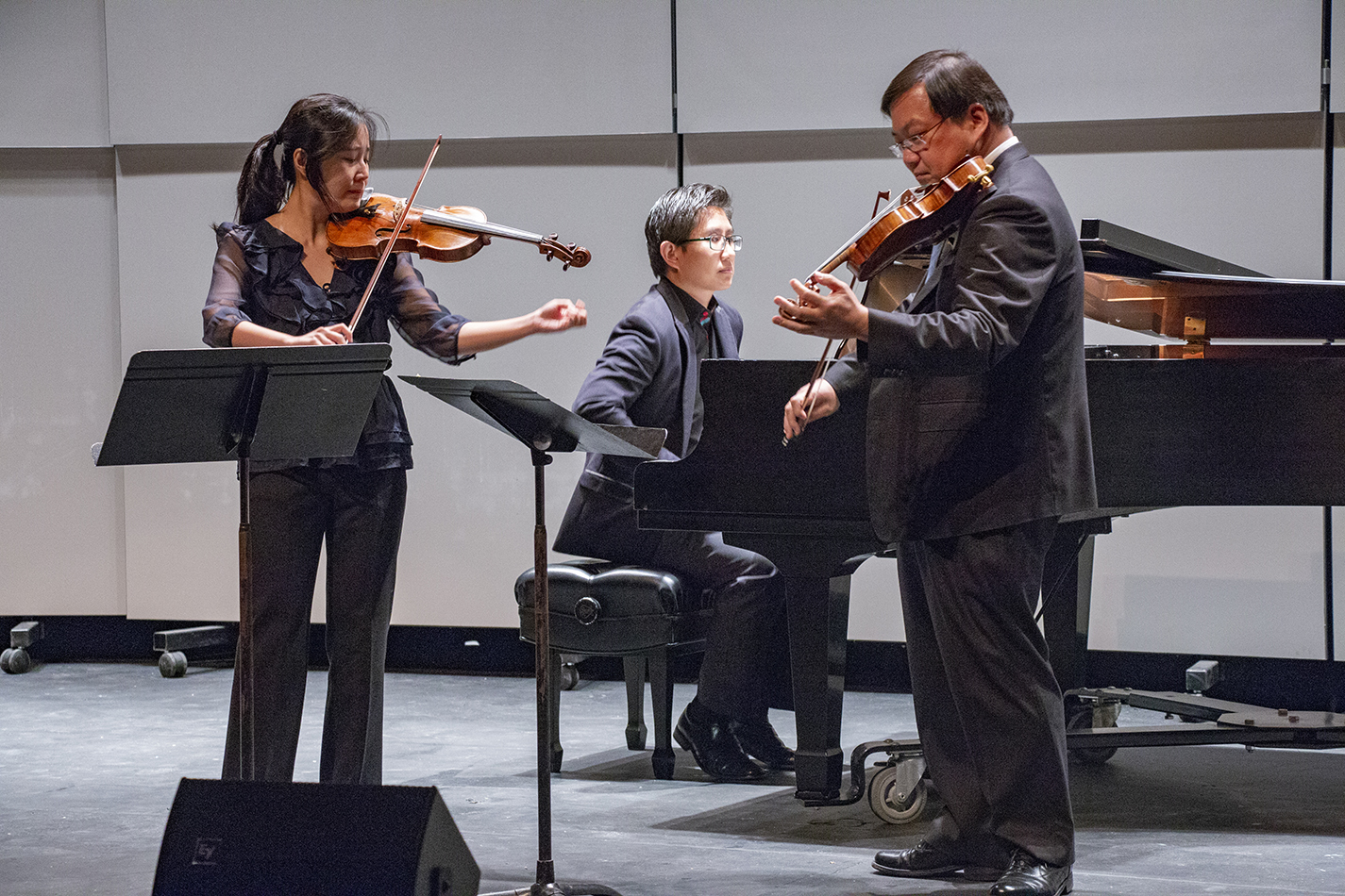 SE music adjunct instructors Tzu-Ying Chan and Michael Shih perform Johann Sebastian Bach’s “Concerto for Two Violins in D Minor” during the Faculty Music Recital Oct. 18 in the C.A. Roberson Theatre on SE Campus.