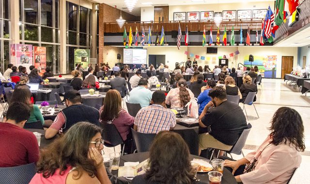 Attendees listen to the keynote speaker at Abrazando al Exito: Embracing Success, which celebrated Hispanic Heritage Month.