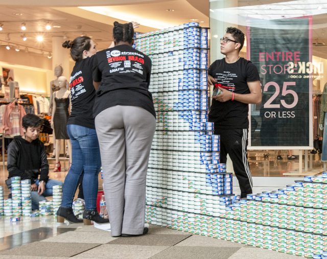 South students put the finishing touches on their can art at Canstruction.
