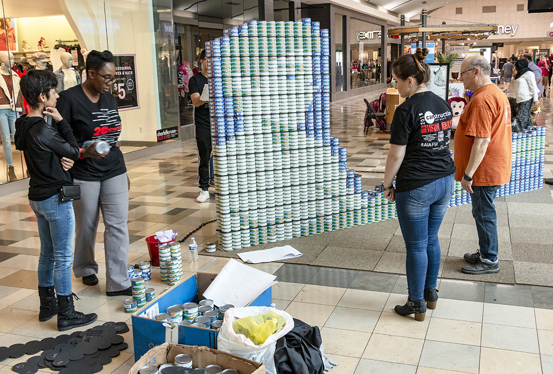 South architectural technology students use canned goods to make art in North East Mall in Hurst during Canstruction on Oct. 14. The cans were donated at the end of the event.
