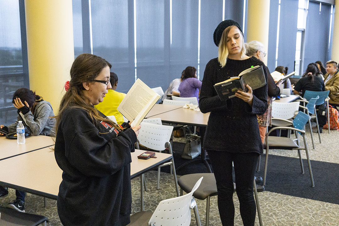 TR students Marietta Huaute and Amberstar Fisher read excerpts from banned or challenged books during the campus’ flash-mob demonstration Sept. 26 in honor of Banned Books Week.