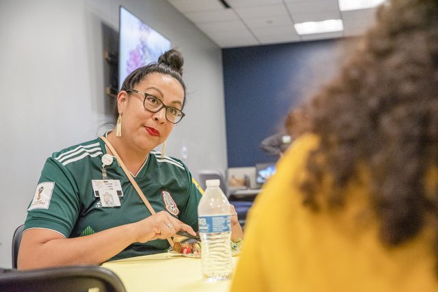 TR Campus staff member Sandra Munoz talks with C.O.M.P.A.S.S. members about the support group. The meet and greet was held on Sept. 12 and its goal was to introduce upcoming mentees to possible mentors. Photo by Joseph Serrata/The Collegian