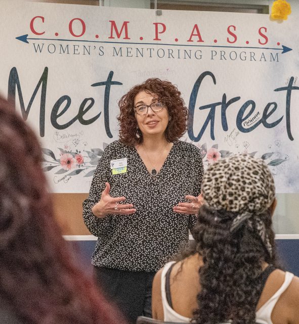 TR vice president of student development services Julie Amon speaks to C.O.M.P.A.S.S. members. Photo by Joseph Serrata/The Collegian