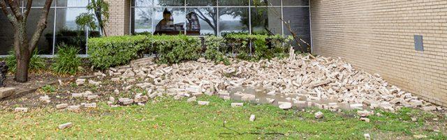 Collegian file photo. The brick facade which fell from the WTLO tower caused $220,884 worth of damage and was the inciting incident that prompted an evaluation of NW Campus by engineering firm Huitt-Zollars. This led to the discovery of deeper issues with many buildings on campus.