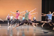 Photo By Joseph Serrata/The Collegian. NE dance company Movers Unlimited performs on stage during “Conversations in Rhythm,” a district dance concert.
