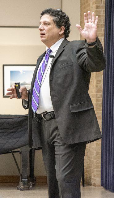 Photo By Joseph Serrata/The Collegian. Award-winning regional attorney Robert Canino speaks to students about the unpredictability of life as well as his career.