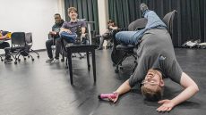 Photos by Joseph Serrata/The Collegian. Bothel displays his over-the-top acting style by sprawling over a chair as he prepares to play Arnold in NW’s upcoming play.