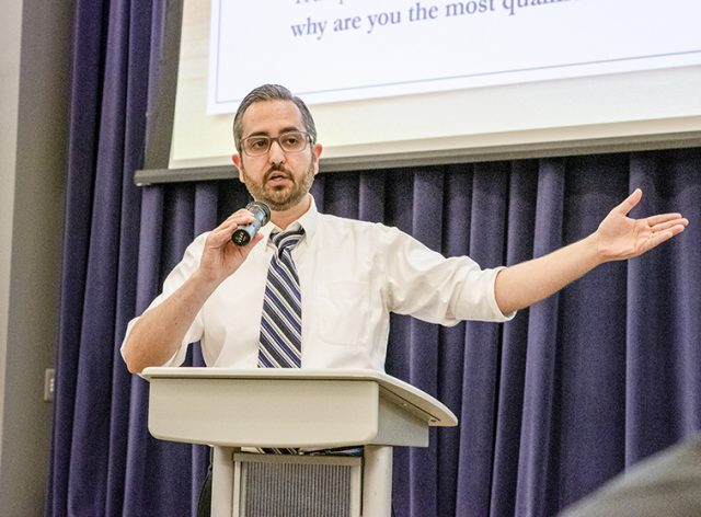 Photos By Joseph Serrata/The Collegian. TR associate professor Rik Sehgal plays Sen. Bernie Sanders during the mock democratic debate that took place on TR Campus Sept. 26 to teach students about the current Democratic candidates.