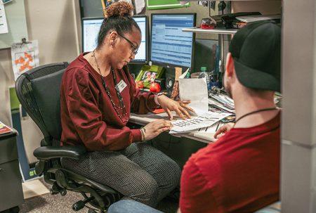 photos by Brooke Baldwin/The Collegian. NE transfer center coordinator Brittni Hollis explains the requirements for the student to optimize his transferring process to UNT during a session Jan. 15.