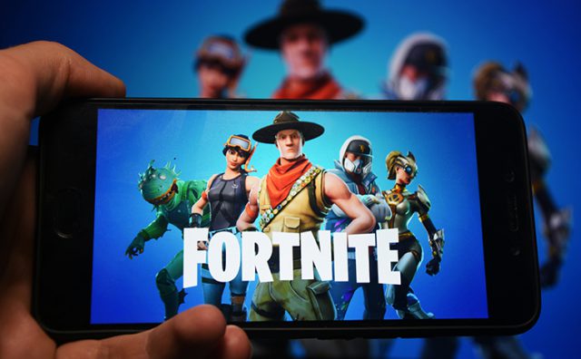 Pryimak Anastasiia/Shutterstock.com. Fortnite becomes a gaming phenomenon due to its appeal to children and the ability to blend pop culture into the gameplay with customizations such as dances, costumes and weapons.