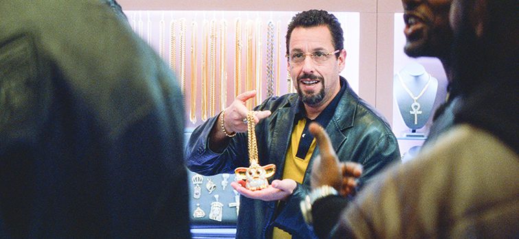 Photo courtesy Elara Picture/A24. Howard Ratner (Adam Sandler) is a gambling-addicted jewelry shop owner who can’t stop making wrong decisions that put his life in jeopardy.