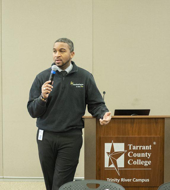 TR director of student development services Carter Bedford talks with attendees about the life of Lorraine Hansberry, the first African American author of a Broadway play. Photo by Photos by Johnathan Johnson/The Collegian