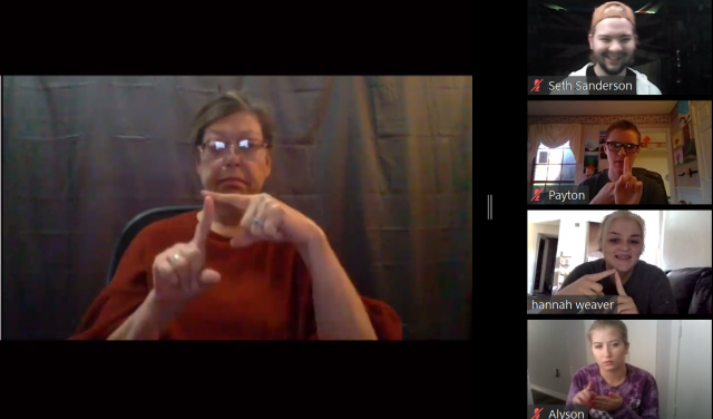 Screenshot from ASL class

TR ASL instructor Cheryl Sohns signs to her students during one of the Zoom
sections. The sound is turned off to imitate the quiet classroom.