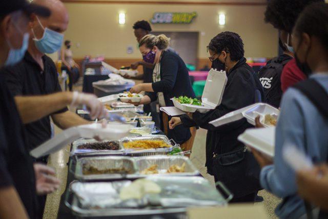 Ian McIntosh/The Collegian
Students lined up at the SE ballroom Sept. 15 to get various culturally accurate foods. Dishes like tamales, pupusas and pan dulce were handed out.  