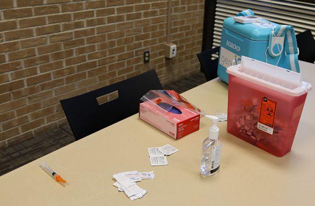 Alex Hoben/The Collegian
COVID-19 vaccinations put into a biohazard bin on NE Campus.