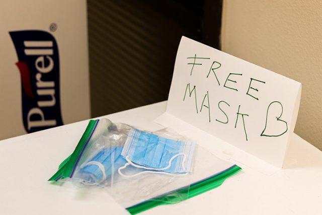 Alex Hoben/The Collegian
Masks sit in a closed sandwich bag for students, staff and faculty, placed on a table on NE’s NFAB building with a sign that says “Free Mask.” 