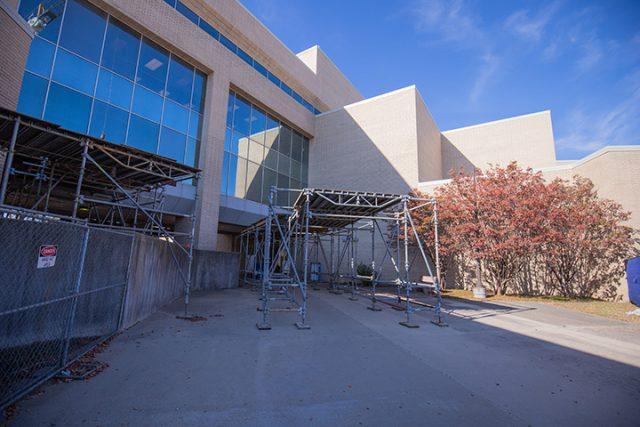 Joel Solis/The Collegian
Scaffolding sits atop entryway, protecting students, staff and faculty before entering the building. The redevelopment project is estimated to be done by 2025. 