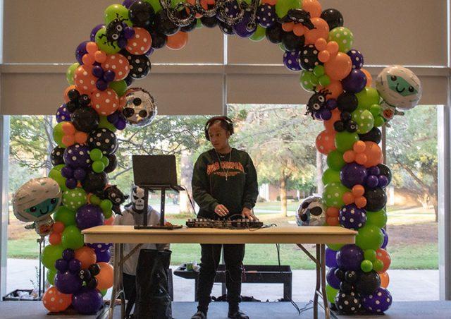 Photo courtesy of Jason Holly
DJ Arre plays some music during Boo at the SSTU Oct. 28. The event had a costume contest, face painting station and other activities for attendees. 