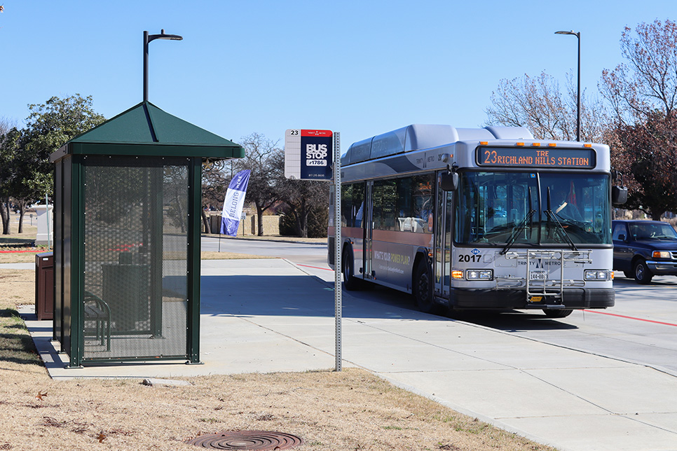 A Trinity Metro bus stop on NE Campus that connects to Richland Hills. Photo by Alex Hobin/The Collegian