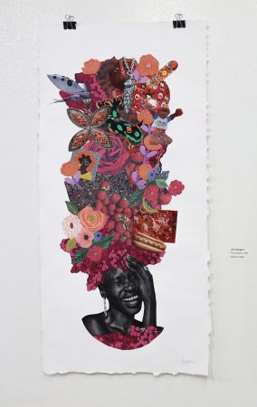 “The Headdress” by John Spriggins, the curator of the exhibit. Photos by Alex Hoben/The Collegian