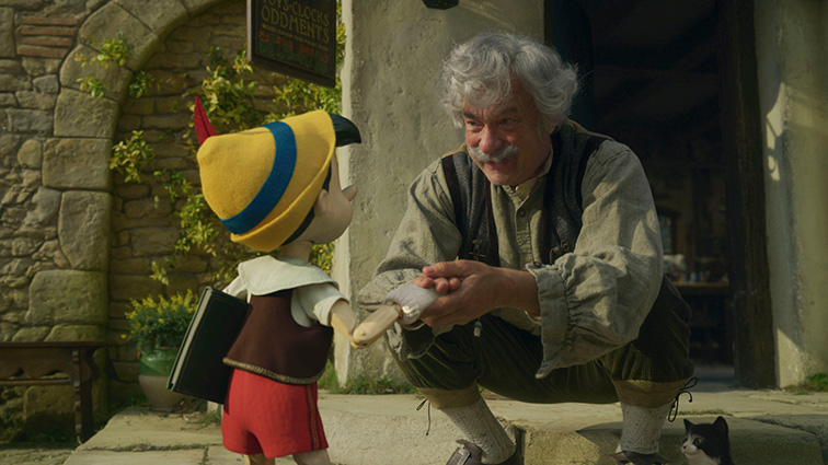 Pinnochio talks to Geppeto during the new movie. Photo Courtesy of Walt Disney Pictures
