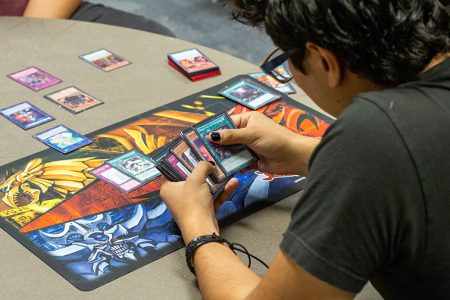 South students play card game “Yu Gi Oh!” during the game tourament held on South Campus on Nov. 2. The tournament included both tabletop and video games for students to play. Photos by KJ Means/The Collegian
