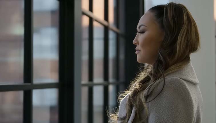 Dorothy Wang gazes out of her New York apartment in the new season of Bling Empire New York. The show was released on Jan. 20. Photo courtesy of Netflix