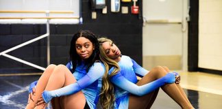 SE students Amaya Brooks and Makel Dandridge pose together on the practice floor of EART at SE Campus in costume, complete with their brown ballet shoes. Alex Hoben/The Collegian