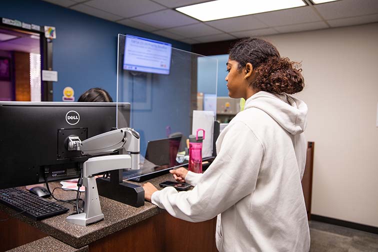 Gem Smikle uses the financial aid office located on NE campus in the NADM building to help with her financial needs this semester. Joel Solis/The Collegian
