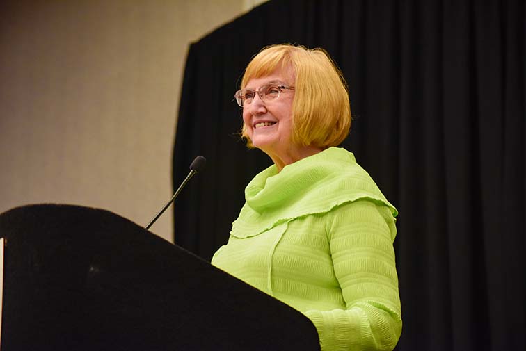 Eddye Gallagher laughs as she gives her acceptance speech at the TIPA 2023 convention. Gallagher was inducted into the TIPA Hall of Fame. Alex Hoben/The Collegian