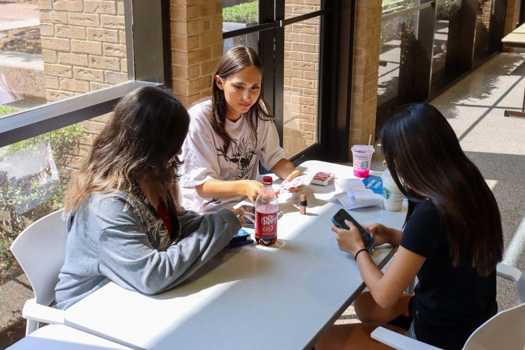 Ariel DeSantiago/The Collegian Collegian Academy students Yaretzy Roman, Riley Wall and Journey Berry play cards in NSTU. They will be taking classes at the NE Campus in the fall semester.