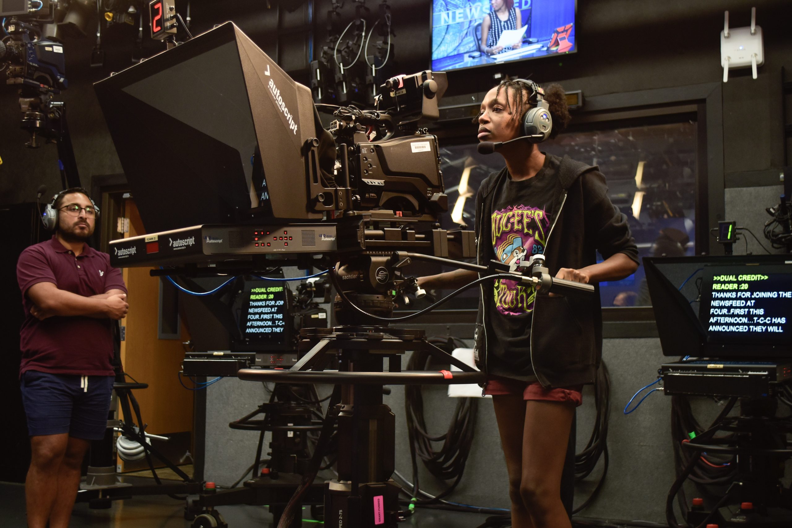 Alex Hoben/The Collegian NE student Rachael Adams operates one of the TV cameras during the TCC Newsfeed broadcast. The Newsfeed is run by the RTVF department and is open to student volunteers. It is a way for students to get on-the-job experience for newscasts.