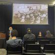 Olla Mokhtar/The Collegian Richard Gonzalez presents to a group of students the history of Latino education with a picture of students in one of the first Latino schools.
