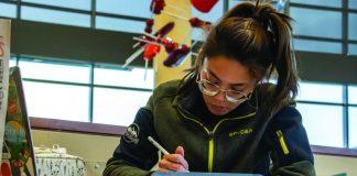 Alex Hoben/The Collegian TR student Krista Flores studies anatomy and physiology in the cafeteria.
