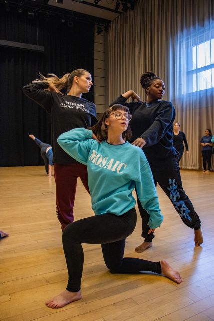 Alex Hoben/The Collegian NW Mosaic Dance Project members Tiffany Willis, Queen D'Amore Peters and Alexandria Joyce practice before Mosaic's performance of "Monsoon." The group has practiced this piece since September.