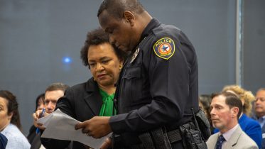Alex Hoben/The Collegian Police Captain Shaun Williams and Chief Human Resource Officer Gloria Maddox Powel at the April 18th board meeting.